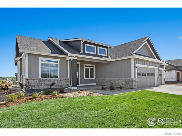 a view of a house with backyard porch and garden
