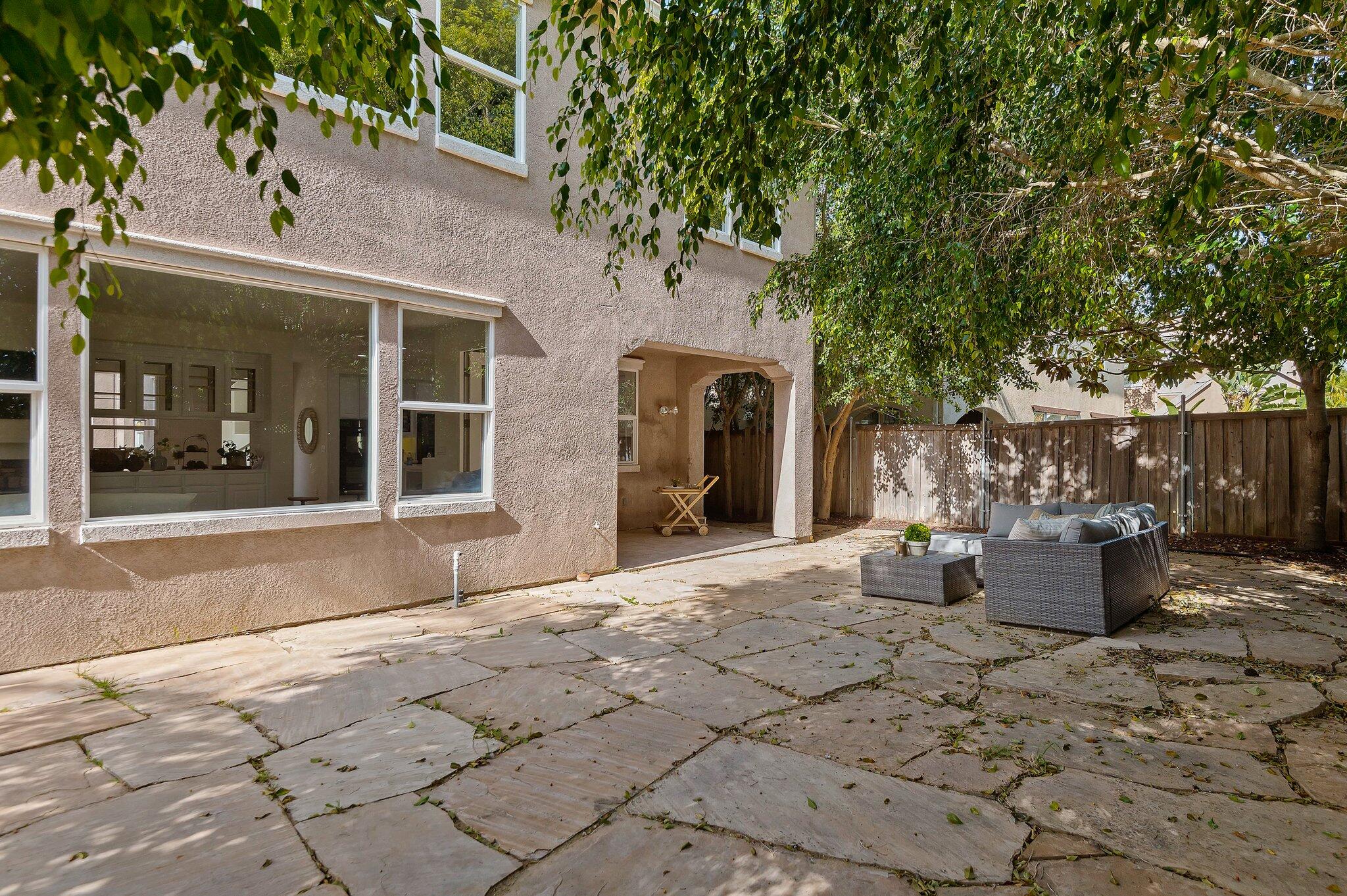 224 King Daniel Lane Goleta, CA 93117 - Photo 18 of 38 a view of a house with backyard and sitting area