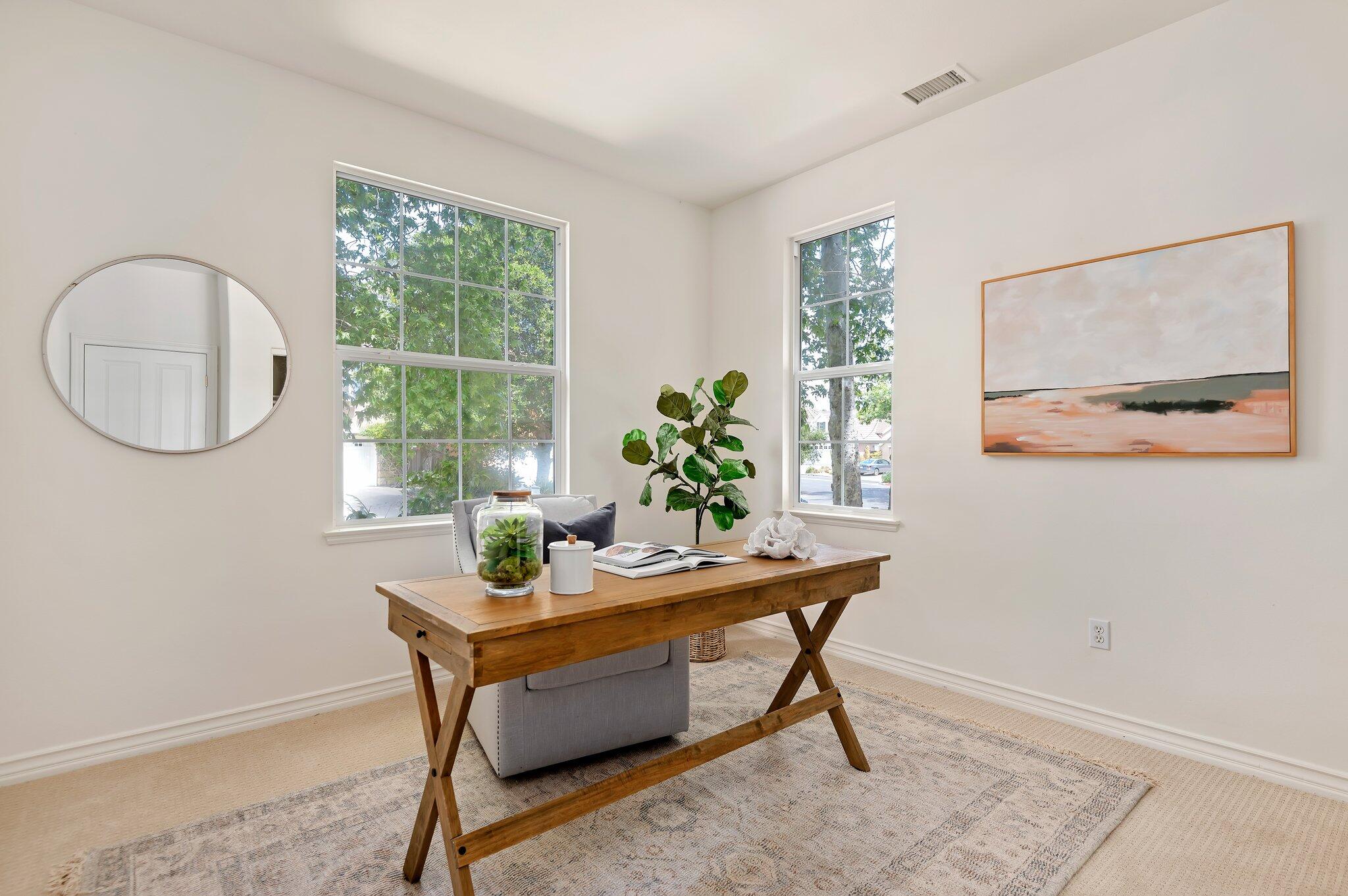 224 King Daniel Lane Goleta, CA 93117 - Photo 19 of 38 a dining room with furniture and a window