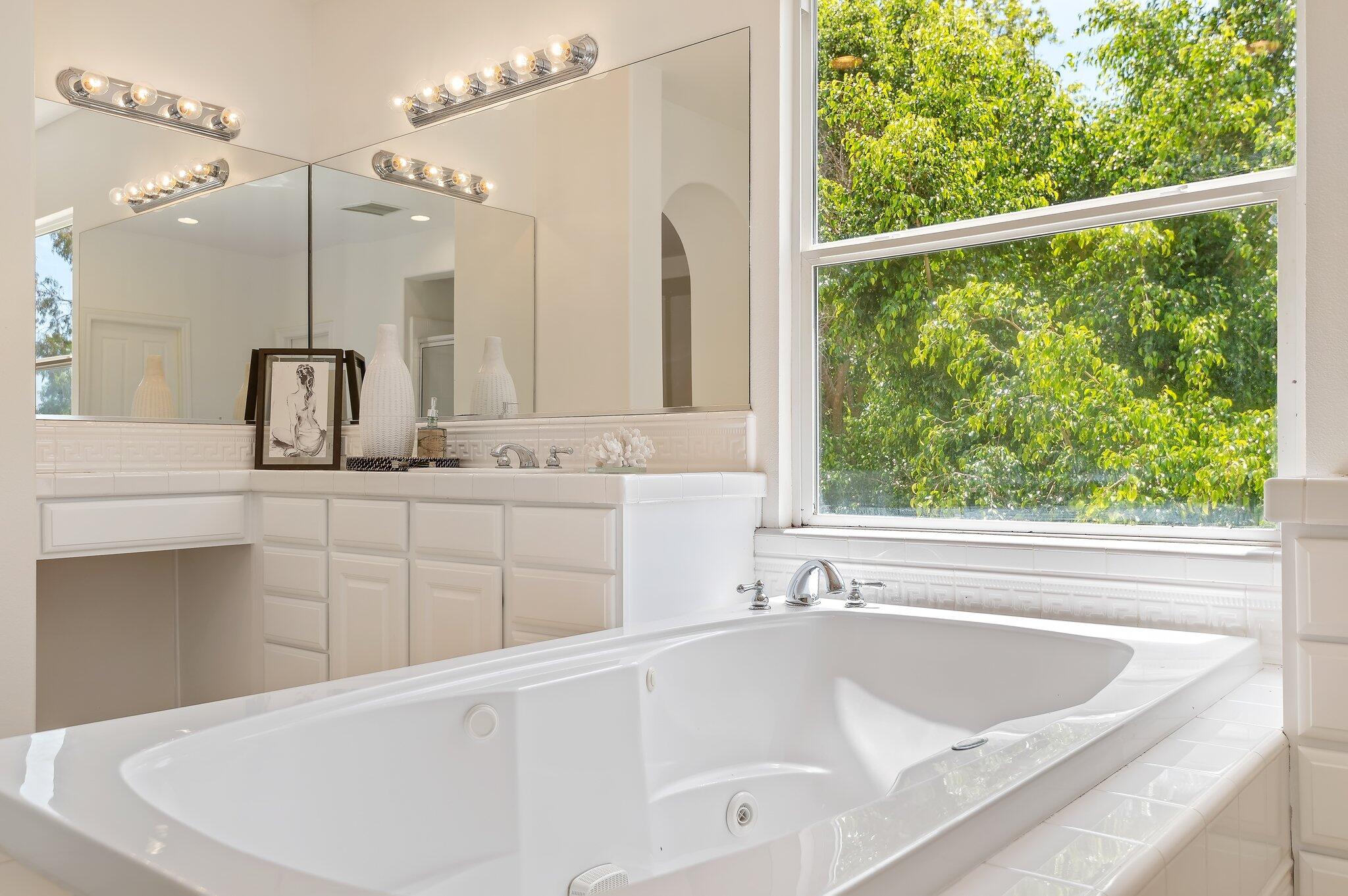 224 King Daniel Lane Goleta, CA 93117 - Photo 29 of 38 a bathroom with a bathtub and a sink