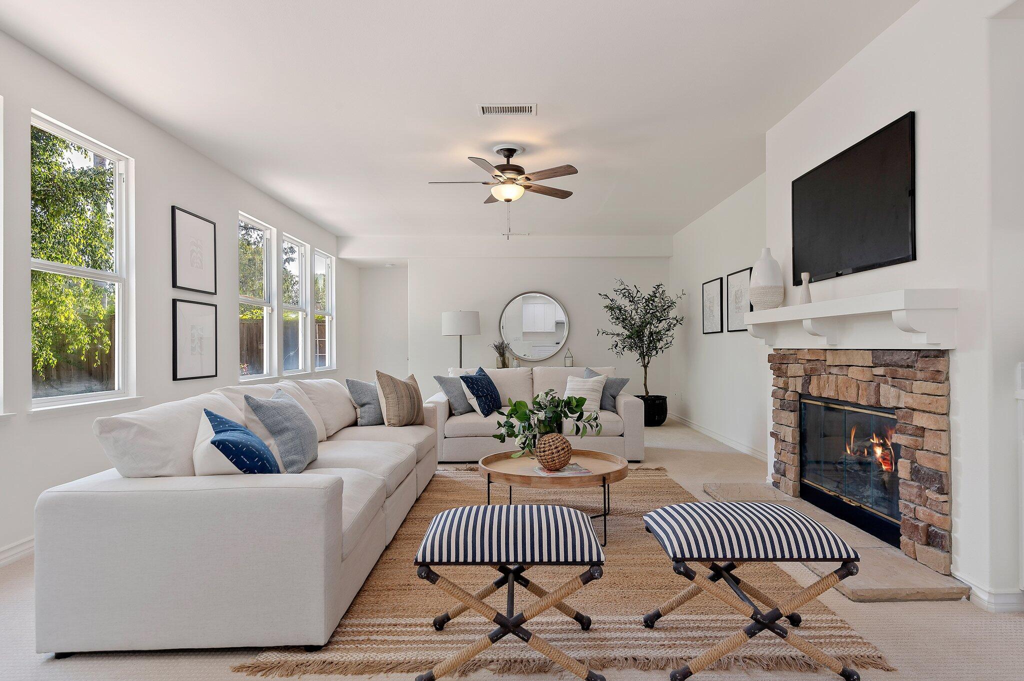 224 King Daniel Lane Goleta, CA 93117 - Photo 9 of 38 a living room with furniture fireplace and a flat screen tv
