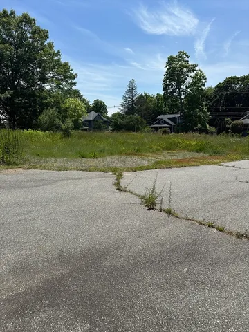 a view of a lake with a big yard