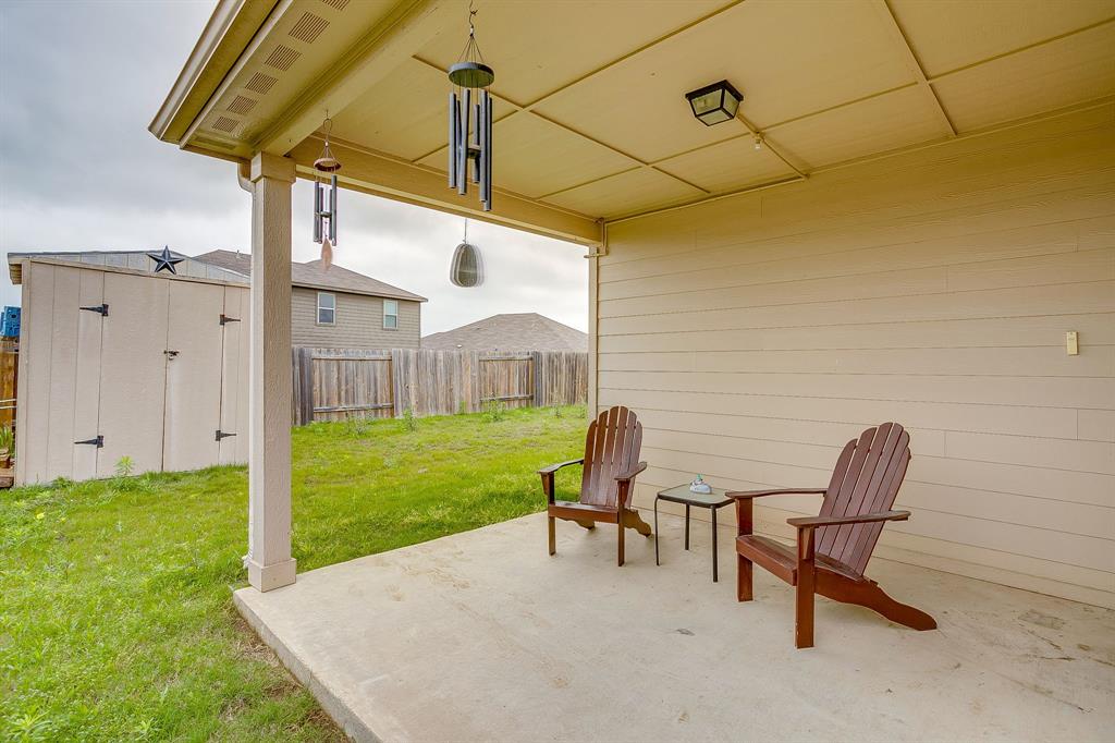 136 Kennedy Drive Venus, TX 76084 - Photo 20 of 27 a view of a patio with a table chairs and a table
