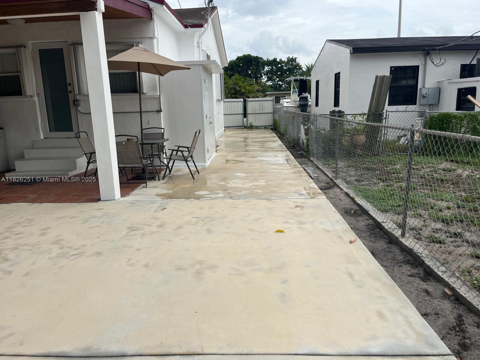 217 East 20th Street Hialeah, FL 33010 - Photo 13 of 22 a view of a backyard with sitting area