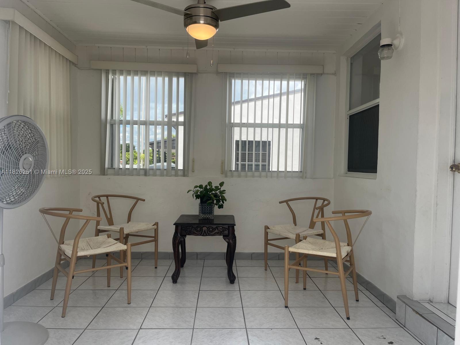 217 East 20th Street Hialeah, FL 33010 - Photo 5 of 22 a dining room with furniture and window