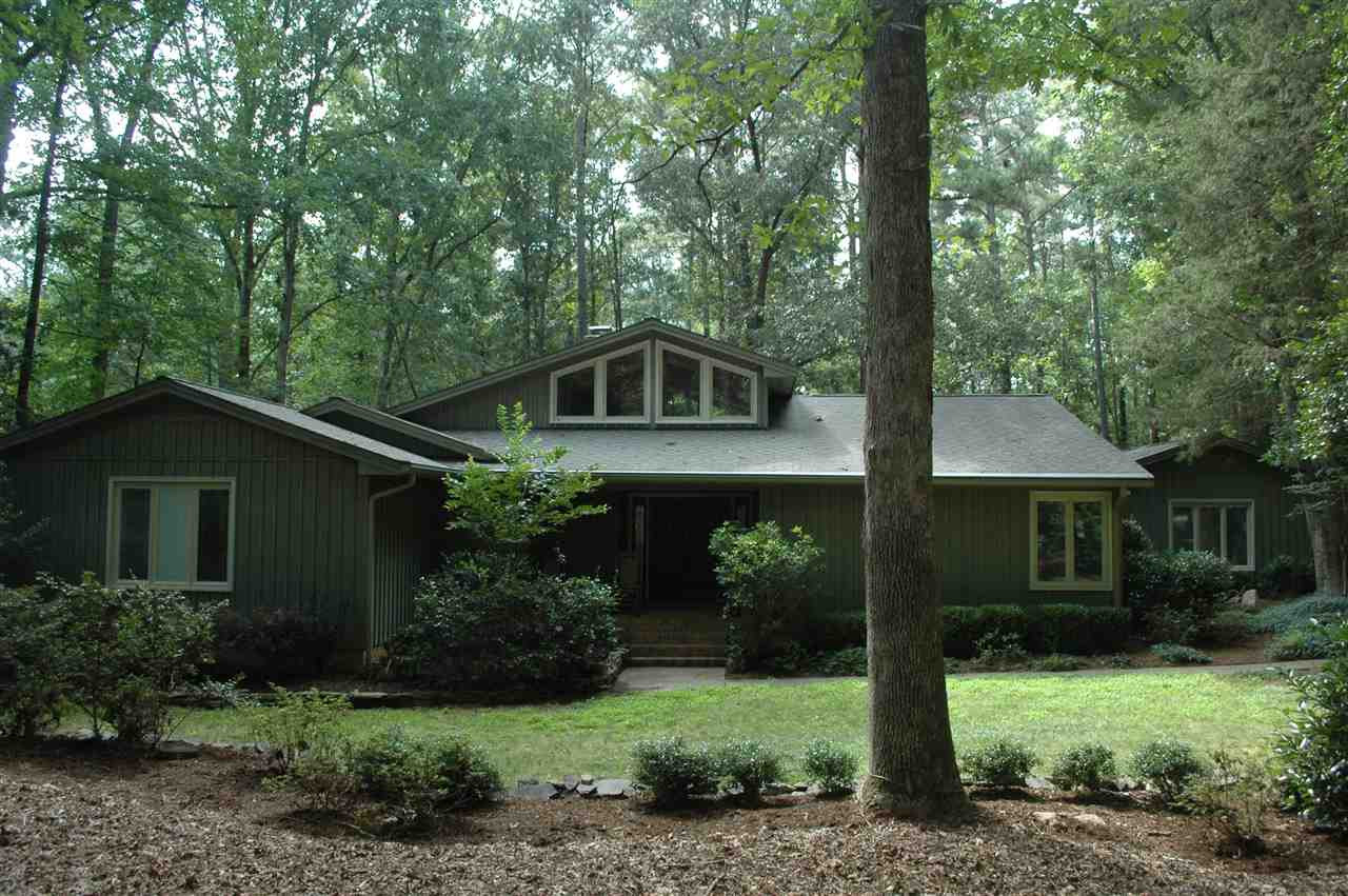 2012 Countrywood Road North Raleigh, NC 27615 - Photo 1 of 18 Soft contemporary ranch nestled on 1.17 private wooded lot in desirable Stonebridge. Open, bright plan with cathedral ceilings and lots of windows. Enjoy 2 neighborhood pools, 2 sets of tennis courts and soccer field. Beautifully maintained and updated. Exterior Front