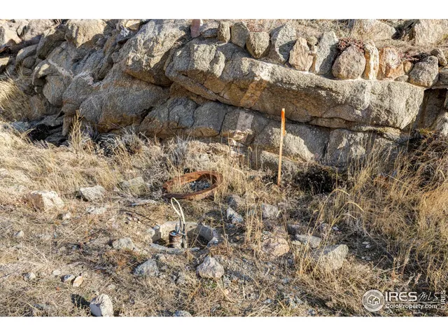 a view of mountain view with mountains in the background