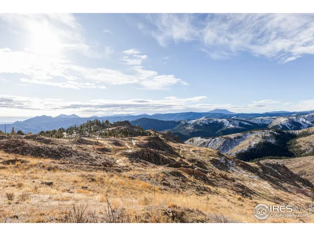 a view of an ocean and mountain