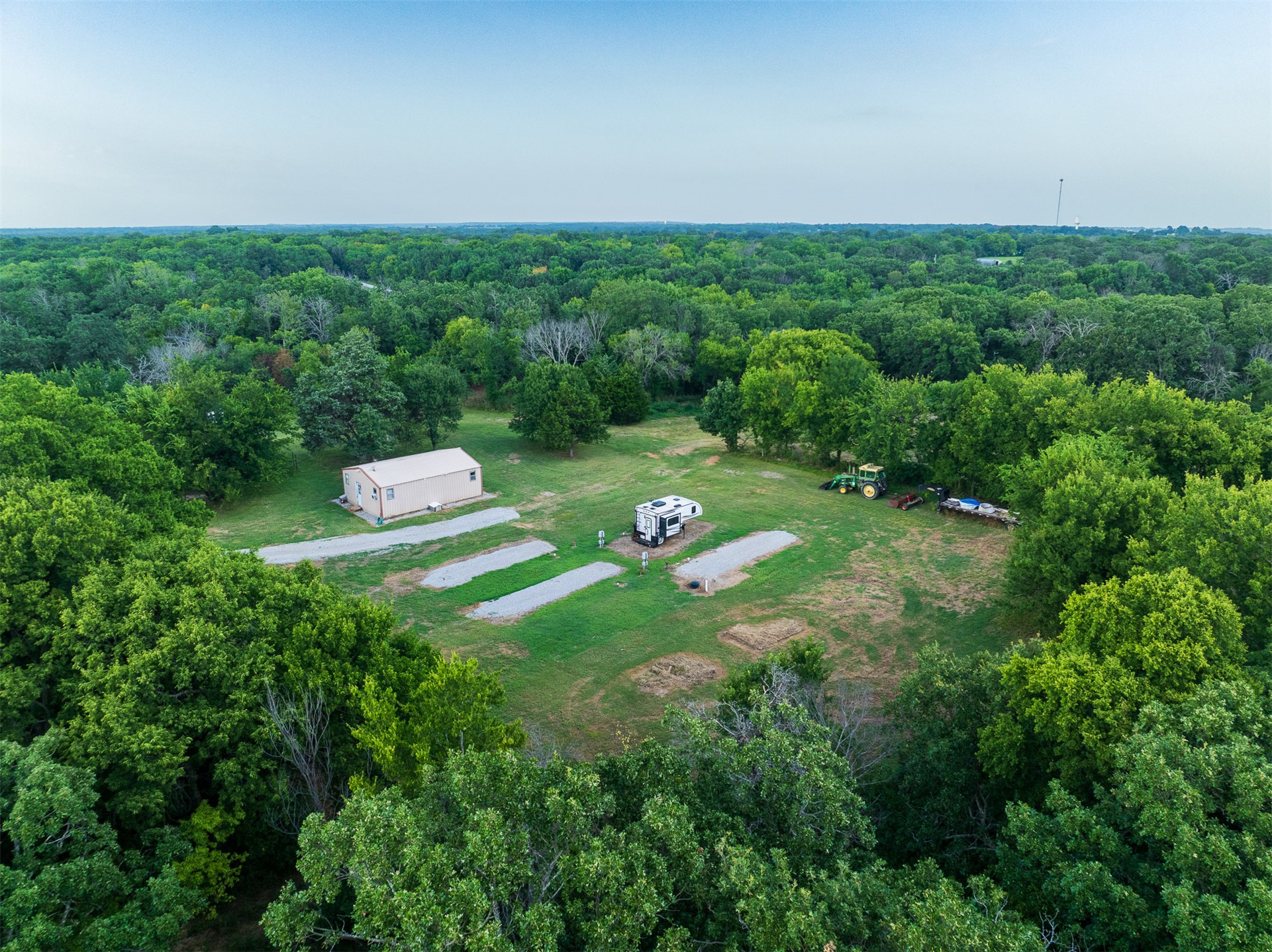 15291 East 400 Road Claremore, OK 74017 - Photo 63 of 96 Spacious cleared lot surrounded by dense mature trees