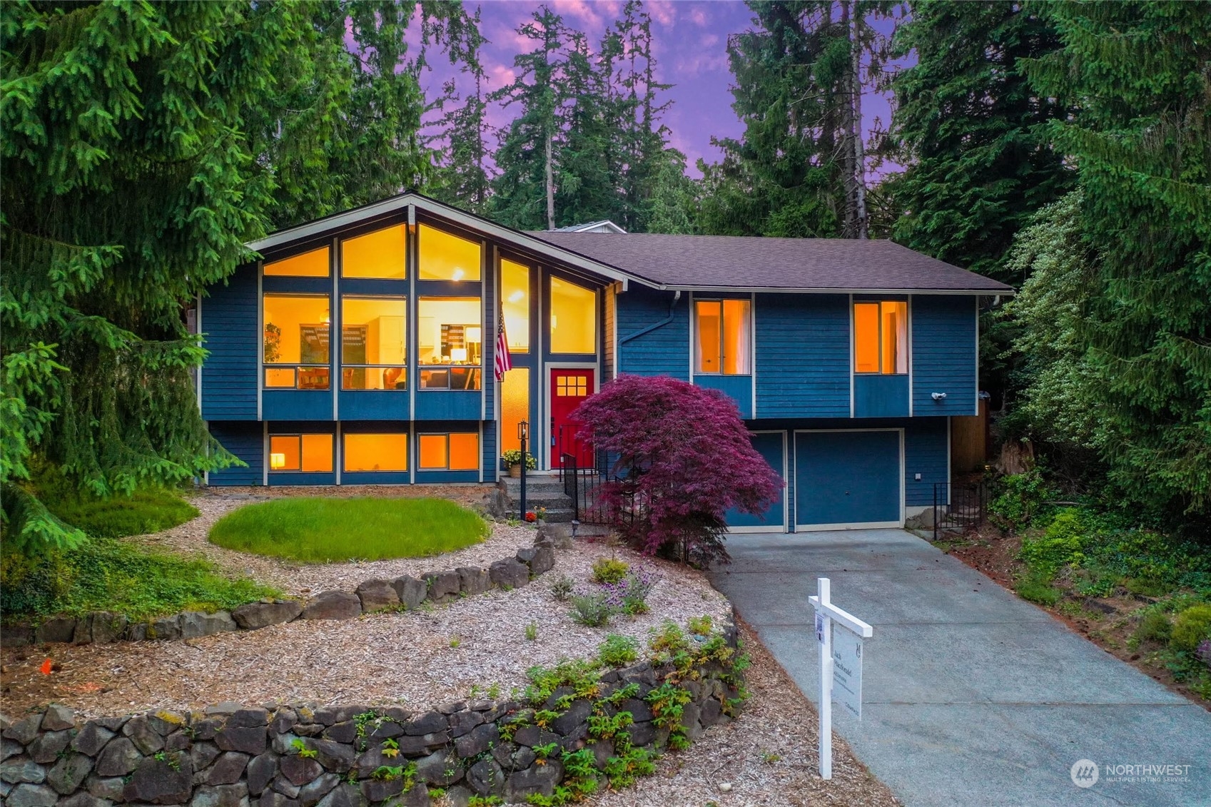 21322 2nd Drive Southeast Bothell, WA 98021 - Photo 1 of 29 a front view of a house with garden