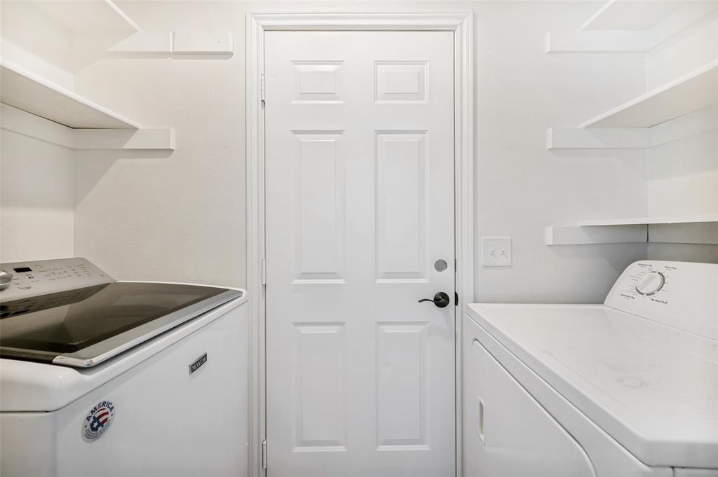 629 Concho Drive Oak Point, TX 75068 - Photo 26 of 35 a utility room with dryer and washer