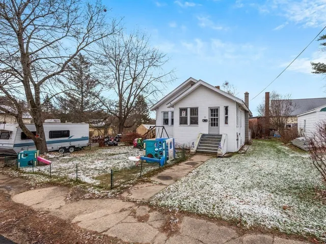 a view of house with outdoor space