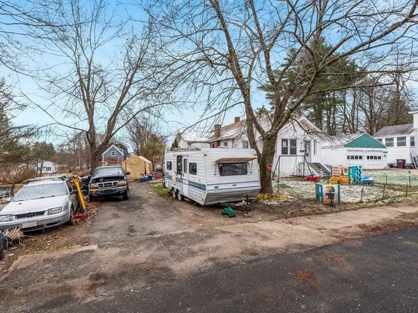a view of cars parked in a parking lot