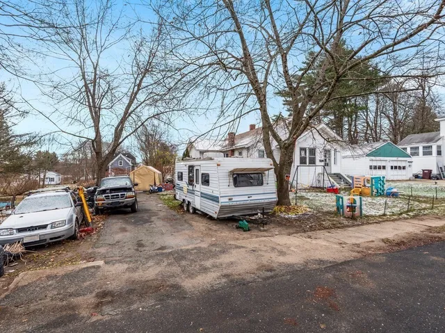a view of cars parked in a parking lot
