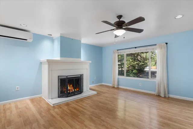 a living room with a fireplace