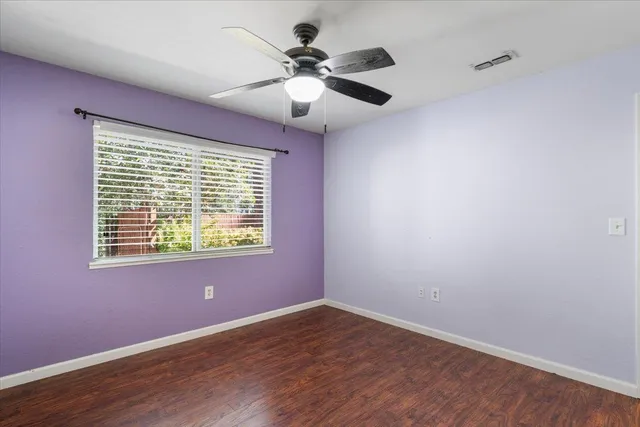 a view of a yard with trees