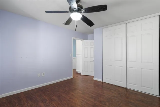 a view of a yard with a tree