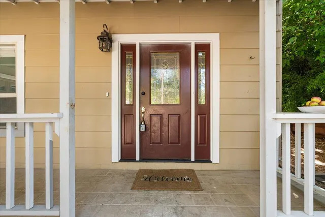 a view of a swimming pool with an outdoor seating