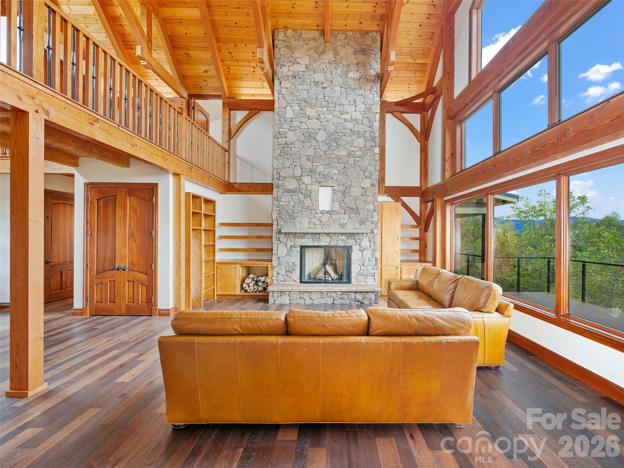 946 Ridge Road Green Mountain, NC 28740 - Photo 14 of 48 a living room with furniture and a large window