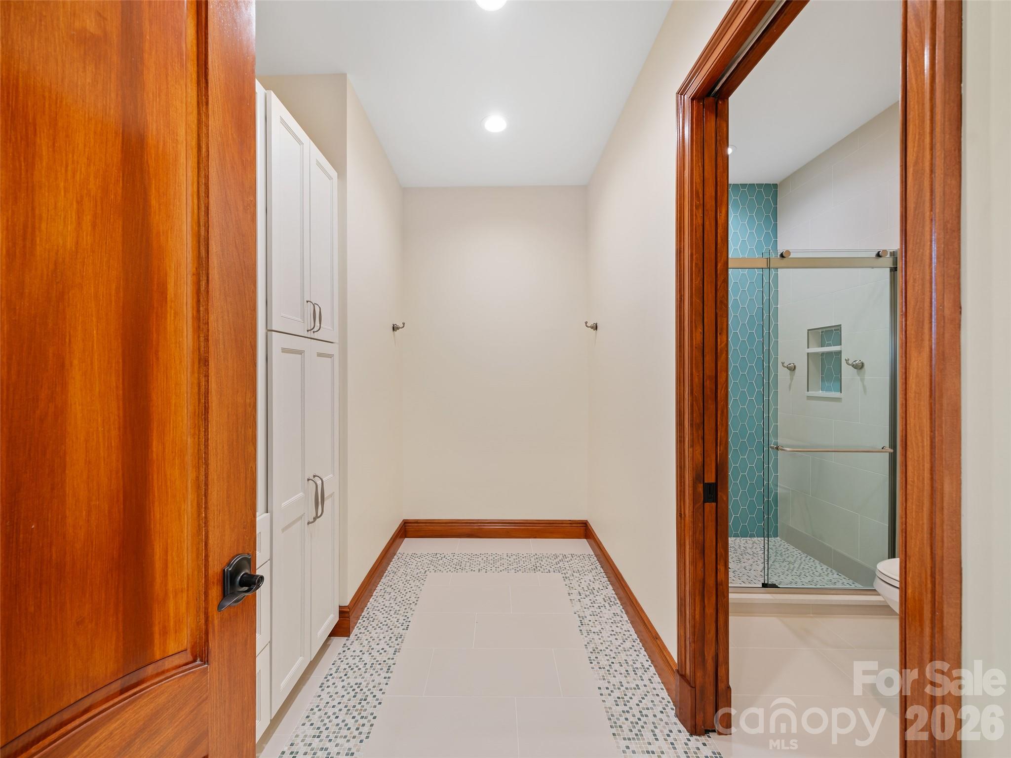 946 Ridge Road Green Mountain, NC 28740 - Photo 28 of 48 a view of a hallway with wooden floor and staircase
