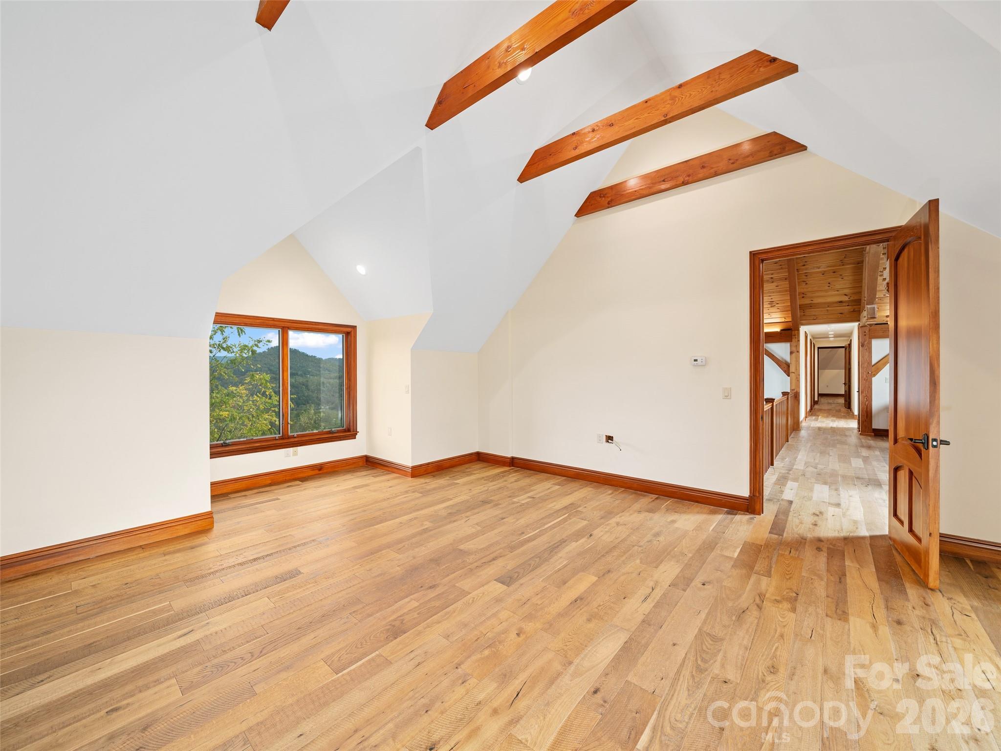 946 Ridge Road Green Mountain, NC 28740 - Photo 36 of 48 a view of empty room with wooden floor