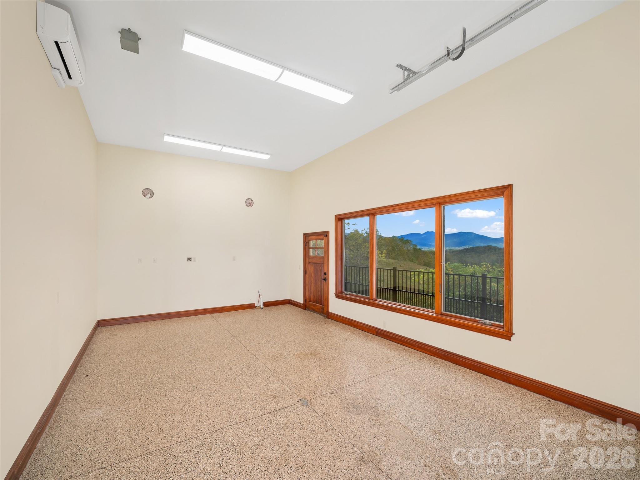 946 Ridge Road Green Mountain, NC 28740 - Photo 48 of 48 a view of an empty room with a window