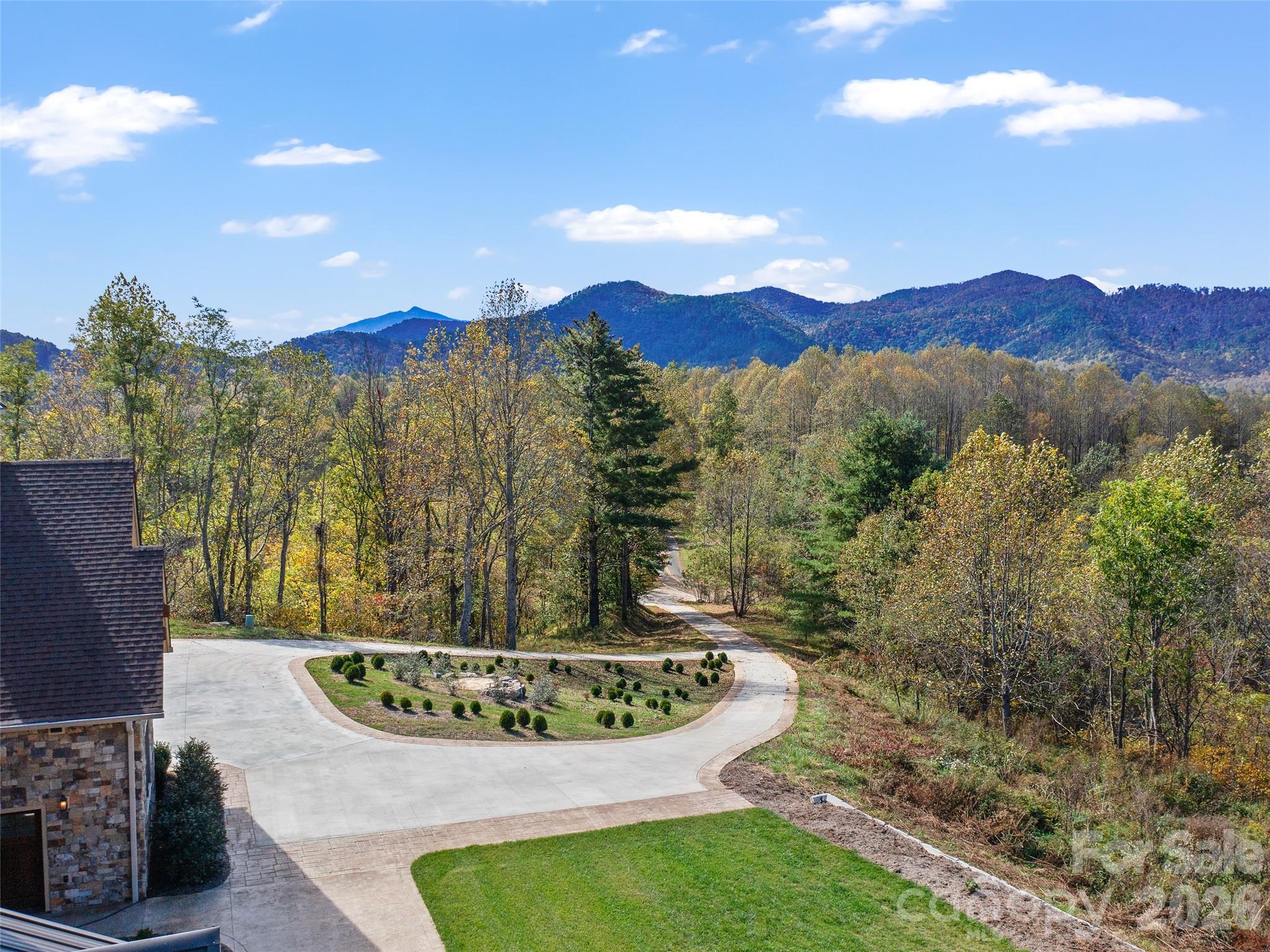 946 Ridge Road Green Mountain, NC 28740 - Photo 6 of 48 a view of a outdoor space with mountain view