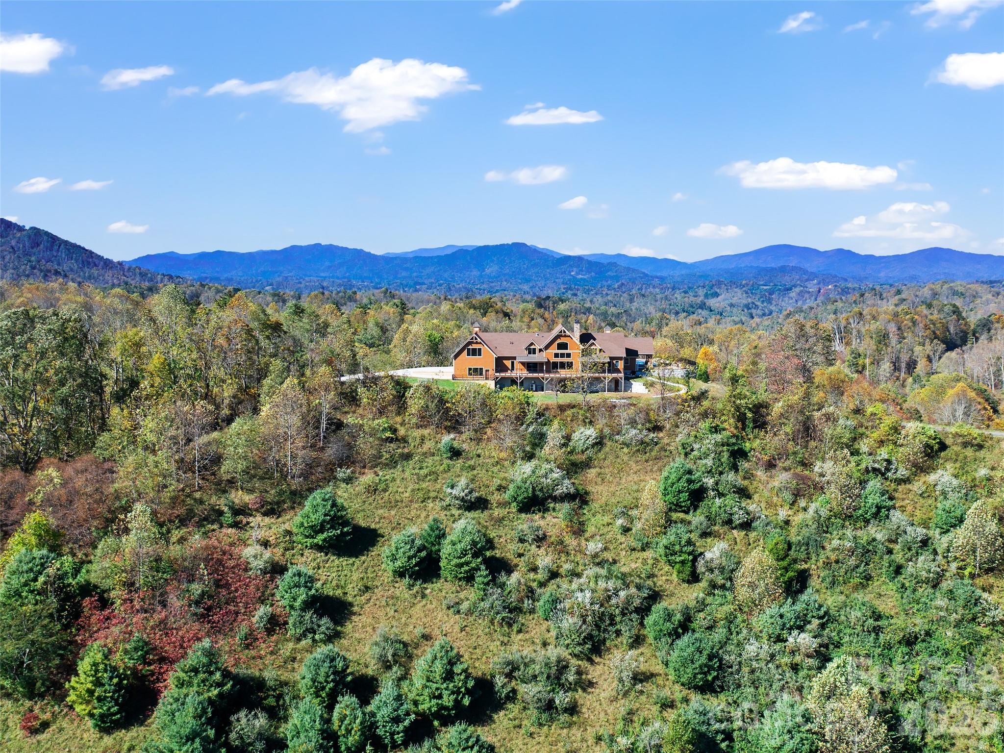946 Ridge Road Green Mountain, NC 28740 - Photo 7 of 48 a view of a city with a mountain