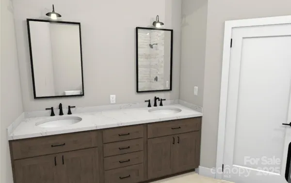 a bathroom with 2 sink and a mirror