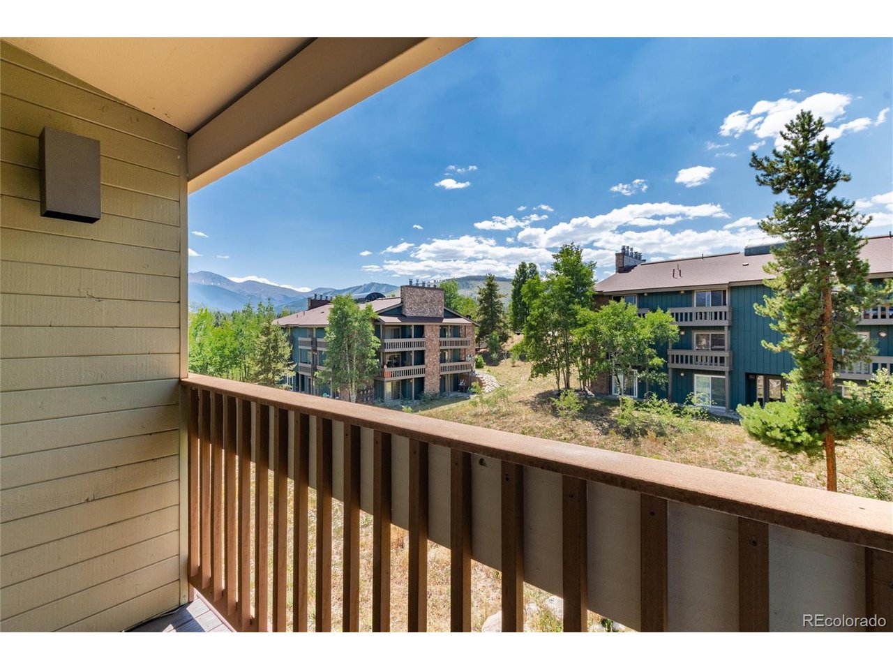 490 Kings Crossing Road, Unit 631 Winter Park, CO 80482 - Photo 38 of 43 a view of a house with a flower garden