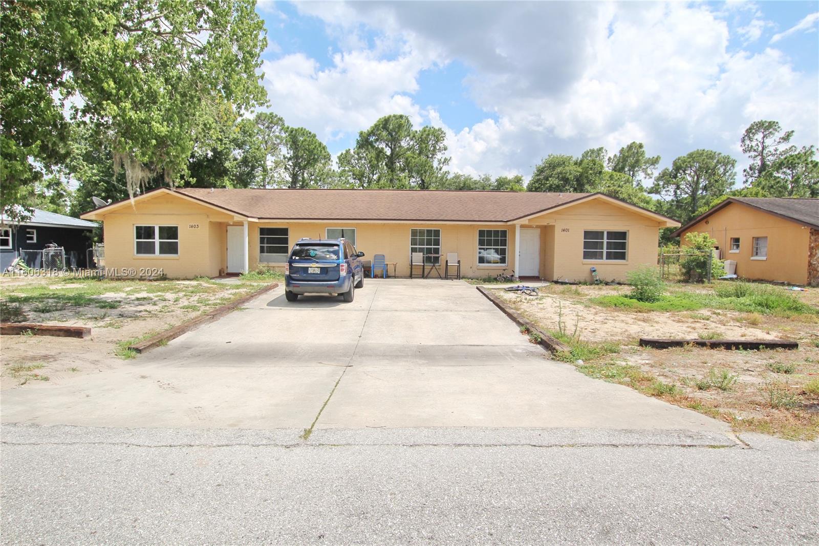 1401 Bassage Road Sebring, FL 33875 - Photo 1 of 18 a view of a house with a patio