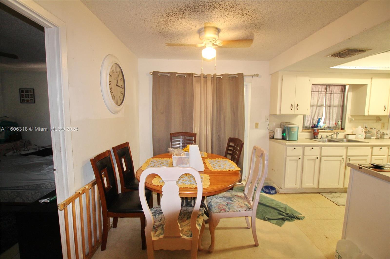 1401 Bassage Road Sebring, FL 33875 - Photo 10 of 18 a view of a dining room with furniture and chandelier