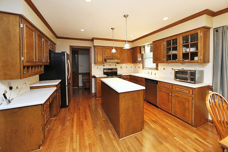 11021 Coachmans Way Raleigh, NC 27614 - Photo 5 of 24 The kitchen is large enough for extra helping hands, or room to just gather 'round. A full bath and mudroom hall are tucked between the kitchen and garage. Kitchen