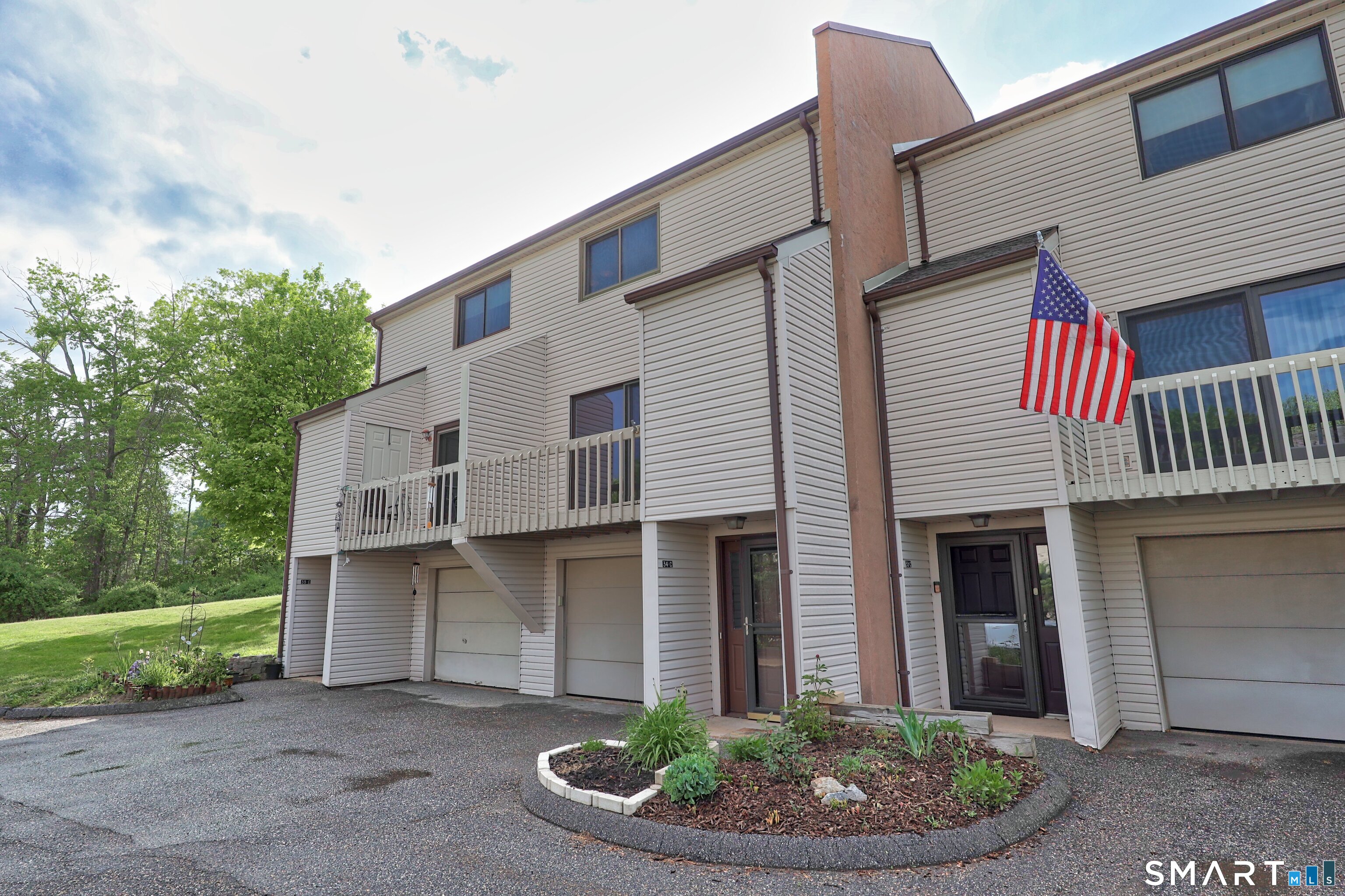 349 Allen Road, Unit 34C Torrington, CT 06790 - Photo 29 of 31 a view of a house with a yard and sitting space