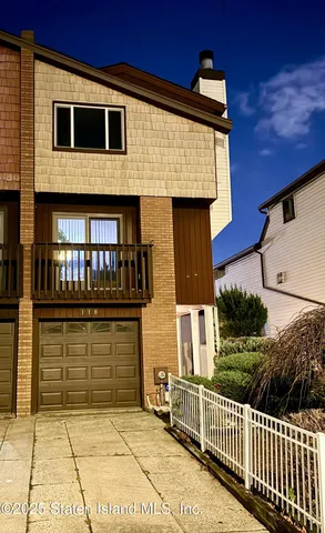 a front view of a house with a porch