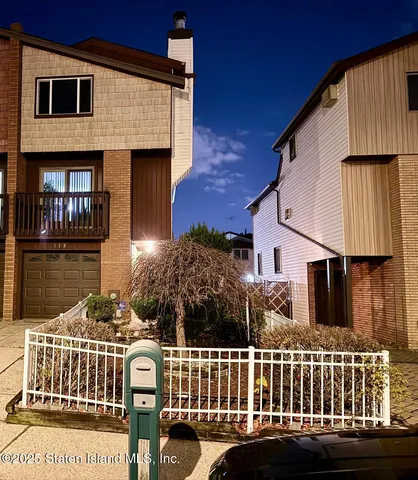a front view of a house with balcony