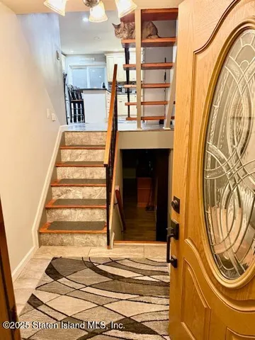 a view of a entryway with a front door