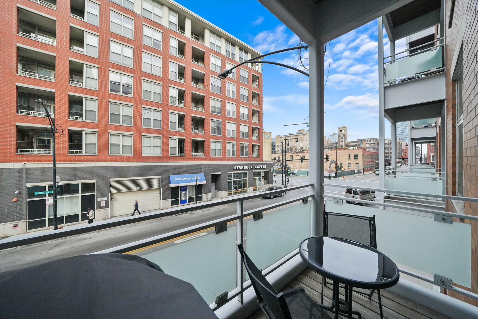 949 West Madison Street, Unit 207 Chicago, IL 60607 - Photo 14 of 31 a kitchen with a table chairs and a stove