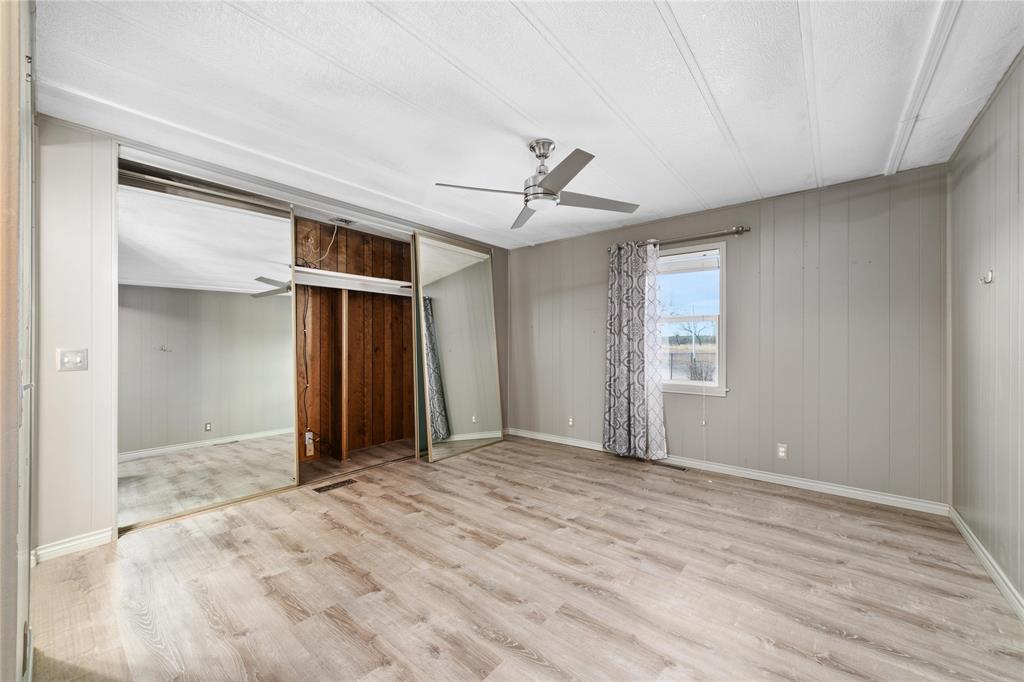 13601 Highway 377 Brookesmith, TX 76827 - Photo 12 of 35 a view of empty room with a ceiling fan