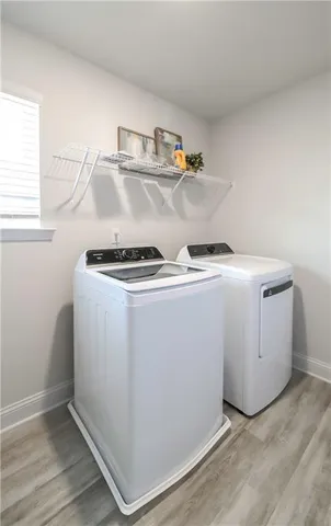 a utility room with dryer and washer