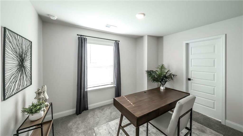 213 Laney Drive Carrollton, GA 30117 - Photo 15 of 36 a workspace with furniture and window