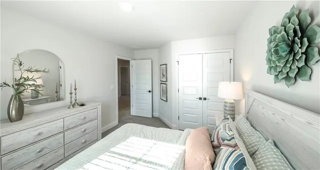 a spacious bathroom with a double vanity sink and a mirror
