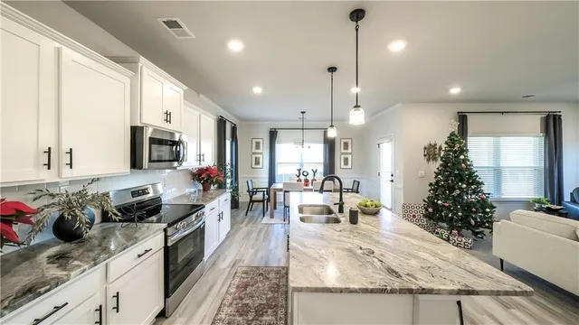 a kitchen with granite countertop lots of counter top space