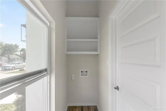 a bathroom with a toilet a sink and shower