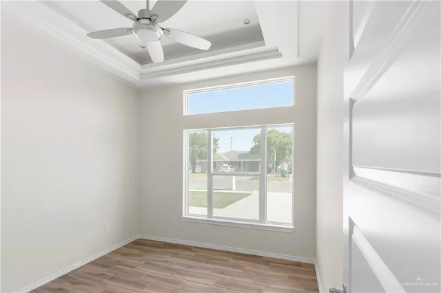 a kitchen with a refrigerator and a sink