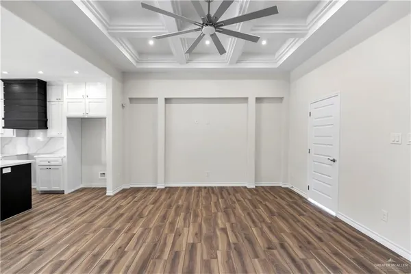 a view of a livingroom with wooden floor