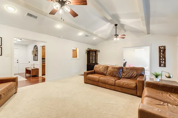 a living room with furniture and a couch