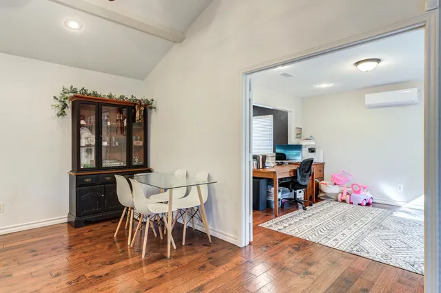 a view of a dining room with furniture