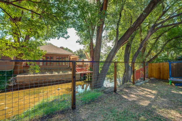 a view of a backyard with a garden