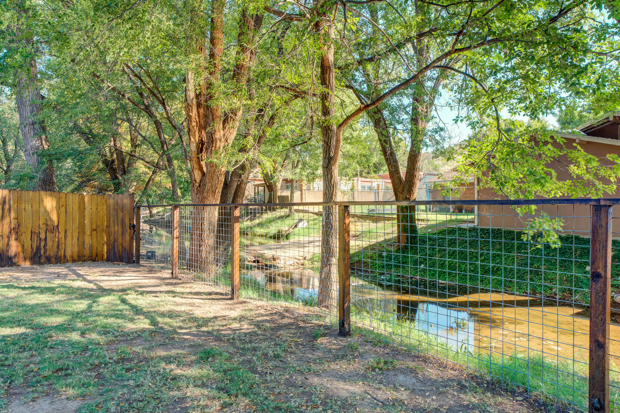 5 West Brookhollow Ransom Canyon, TX 79366 - Photo 4 of 62 a view of a backyard with a garden